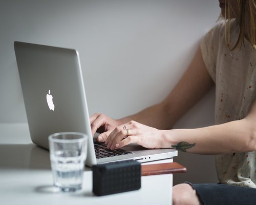 Glass of water on an office desk